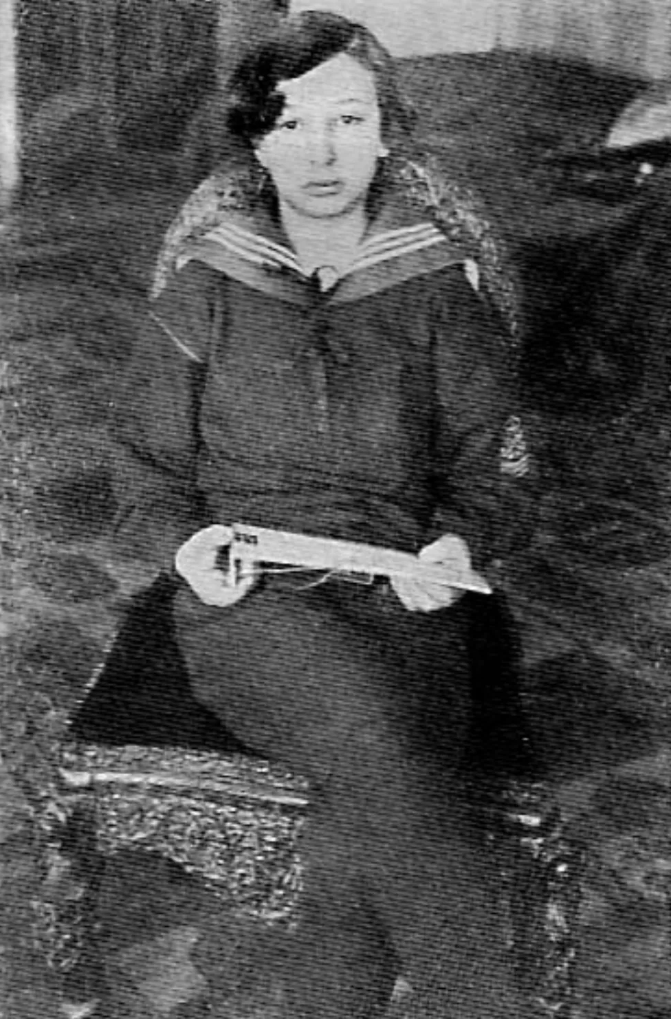 Young Josef Ganz in sailor suit holding his patent, circa 1910